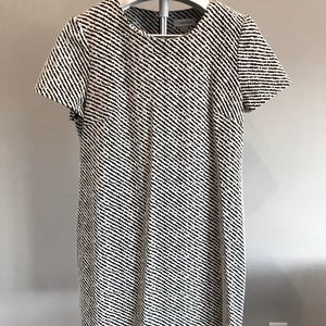 Black & white striped Calvin Klein dress with zipper back in size (12).